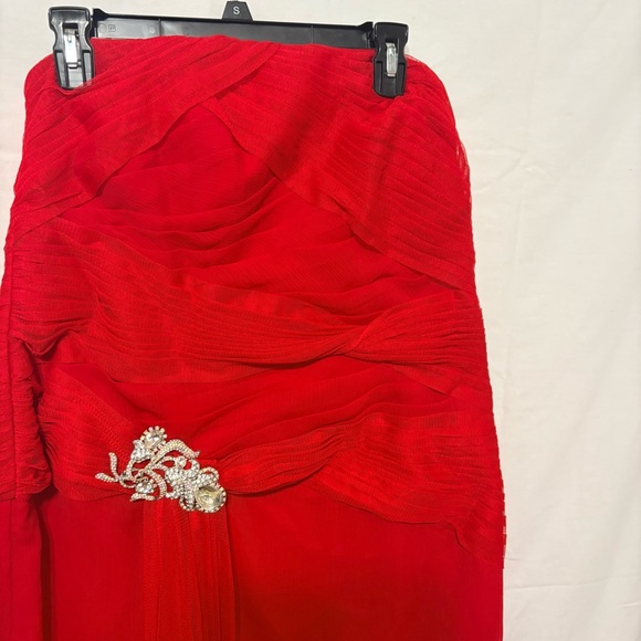 Red strapless gown is a Faviana style 7131 formal dress - Picture 3 of 9